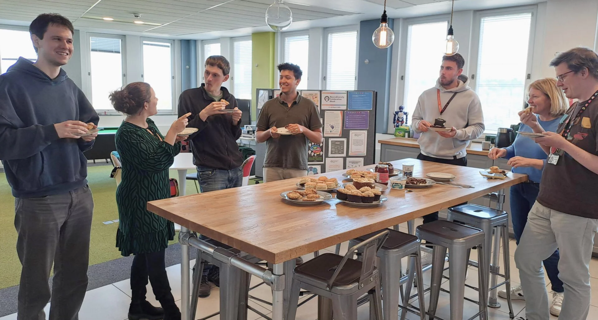 Ripjar staff enjoying tea and cake